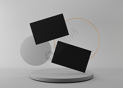 灰色背景上带金戒指的空白黑色名片 品牌标识的样机 两张牌显示双方 图形设计师的模板 自由空间 复制空间 3D 渲染图片