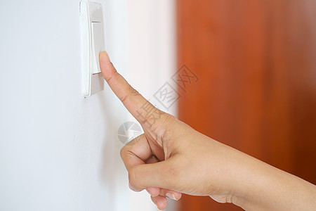 手指转动灯开关蓝色控制按钮公用事业塑料女士活力力量白色住宅图片