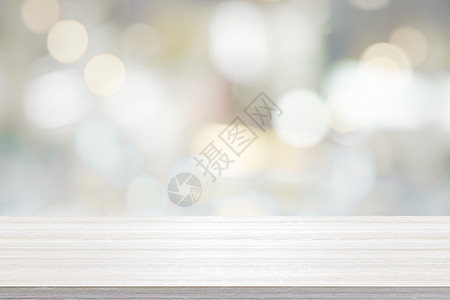 Bokeh模糊背景图像中当前产品的空木板表台面桌面海报营销柜台火花展示桌子商业甲板图片