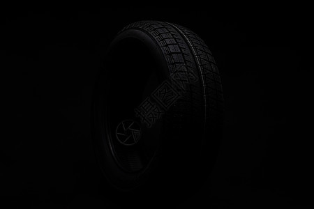 黑色背景的黑黑色轮胎图片