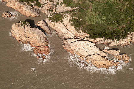 海边的旋翼和岩石 照片来自浙江太州泰州支撑海岸风景砂岩天线海景海岸线海洋绿色环境图片