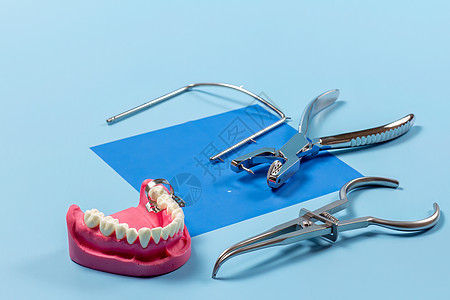 一套用于牙齿牙科护理的金属牙牙床工具围堰橡皮夹钳口腔科卫生框架乐器诊所治疗药品图片