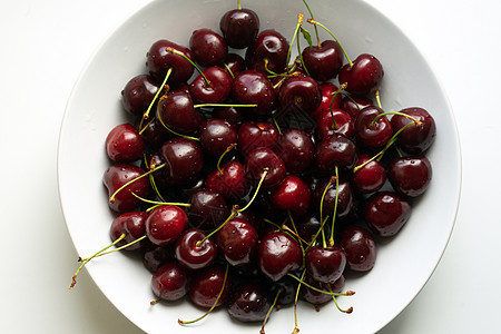 健康的饮食和食物概念  白碗中的樱桃水果盘子工作室花园浆果甜点果汁图片