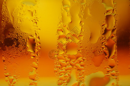 石油 水和颜色混合的移动泡沫气泡蓝色液体墨水绿色黄色框架红色橙子摄影图片