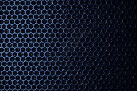 音乐扬声器上的安全网 保护网格音频扬声器 黑色安全网的近景 金属穿孔网 抽象图案 抽象黑色背景 专业音响设备金属材料力量喇叭工业图片