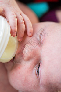 新建女孩新生眼睛女性头发瓶子婴儿动物背景图片