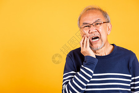 触摸牙痛脸颊的伤痛手 抚摸面颊成人牙疼痛苦医生男性灵敏度保险男人疾病牙齿图片