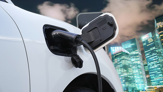 生态友好型清洁能源概念与EV车和城市风景相配电缆绿色电动车天际电池车站发动机地平线充值引擎图片