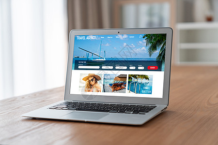 旅游机构网上网站 用于进行现代搜索和旅行规划监视器屏幕桌面电话技术电脑海滩办公室男人假期图片