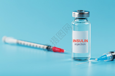一瓶胰岛素激素 和桌上的注射器药理药物安瓶治疗液体糖尿病处方疫苗制药胶囊图片