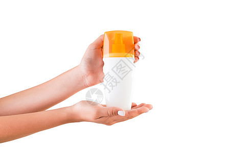 女性手握奶油液瓶 单独隔离女孩在白色背景上提供化妆品制品温泉橙子皮肤女士液体塑料产品卫生身体药品图片