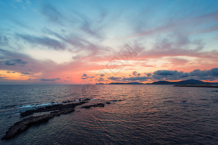 海边天空阿尔盖罗湾多彩的日落观光假期橙子旅行太阳场景海洋地平线旅游天空背景