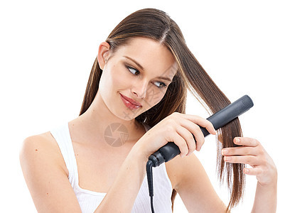 女人 带直发器的头发和带头发护理的美容 工作室背景下的电动美容工具 直发 角蛋白和发型处理 健康和修饰闪耀图片