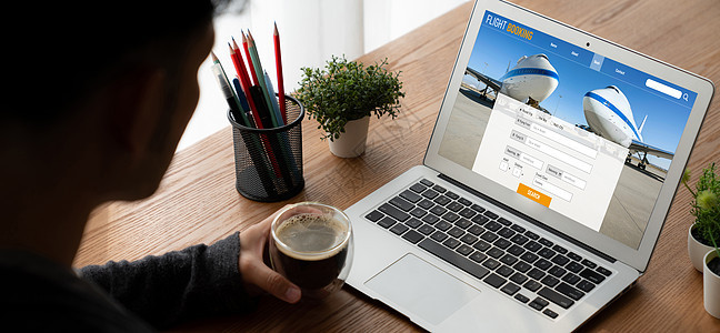 在线航班预订网站提供现代订票系统 n技术酒店网络旅游展示飞机假期屏幕桌子空气图片