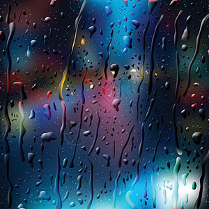 夜中城市道路的灯光模糊 透过湿玻璃查看图片