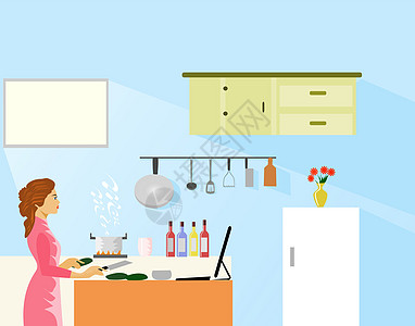 女人通过在厨房里看互联网烹饪方法来制作食物 背景是厨具图片