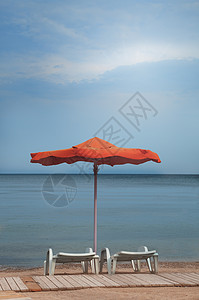 海滩 自然 海滨 雨伞 日光浴 旅游 阳伞 假期 温暖的图片
