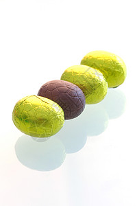 复活鸡蛋 假期 糖果 喜庆的 巧克力 棒棒糖背景图片
