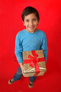 有圣诞礼物的男孩 弓 红色的 庆祝 喜悦 圣诞老人图片