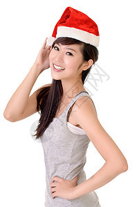戴圣诞圣诞老人帽子的亚洲美人图片