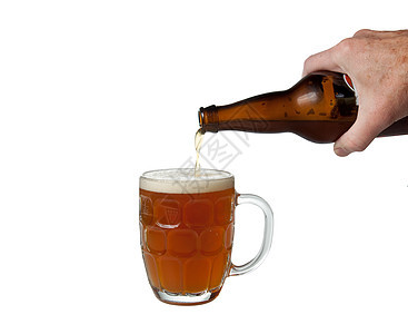 啤酒从酒瓶中倒入酒杯 泡沫 金的 马克杯 贮藏啤酒 反射图片