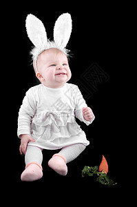 兔子服装和胡萝卜的有趣婴儿图片