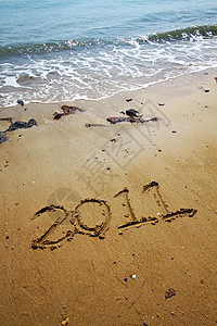 2011年关于沙子的文章 假期 水 放松 日历背景图片