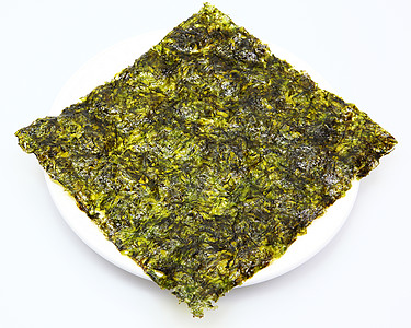 用橄榄油炸成一盘白色的大薄片海藻煎锅图片