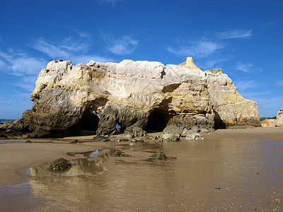 葡萄牙阿尔加维海岸的洞穴和多彩岩层 悬崖 水图片