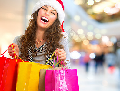 圣诞购物会 购物购物中心有包的女人 销售部 销售量 圣诞老人图片
