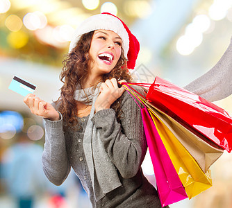 圣诞购物会 购物购物中心有信用卡的女孩 销售部 喜悦 漂亮的图片
