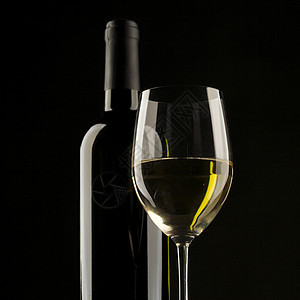 白葡萄酒玻璃光影黑色背景 食物 波尔多 运动 红葡萄酒图片