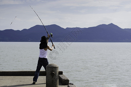 捕鱼渔民在海上钓鱼 海洋 充气的 男性 运动 享受 男人图片