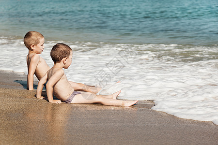 海滩上的儿童 旅行 太阳 活动 热带 男生 假期 家庭图片