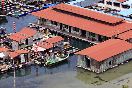 中国海南的吉卜赛人村 钓鱼 房子 深的 窝棚 船图片