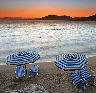 Pefkos地中海日落 阳伞 爱琴海 铑 希腊岛 黄昏图片