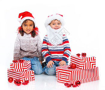 圣诞老人帽子里带礼物盒的小孩 庆典 传统 展示图片