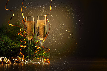 新年派对上香槟的玻璃杯 弓 葡萄酒 前夕 假期 庆典图片