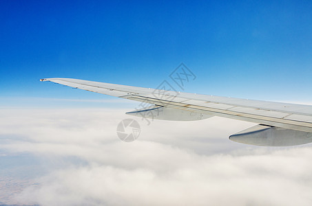 飞机机翼窗外 全景 蓝色的 喷射 技术 气氛图片
