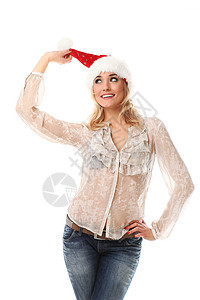 穿着圣诞帽子笑着的年轻临时女青年 美丽的 头发图片