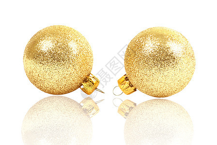 两个金色的圣诞球 传统的 玻璃 假期 庆典 金子图片
