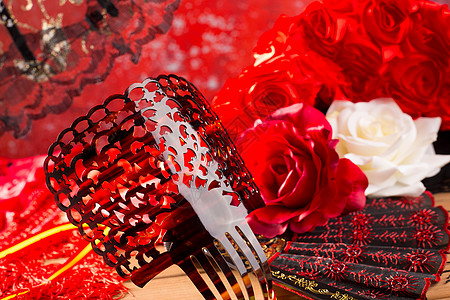 西班牙西班牙典型的Flamenco 梳子粉丝和玫瑰 织物 传统图片