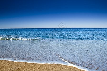 美丽的海滩 海洋 阳光 地平线 水 夏天 波浪 温暖的图片
