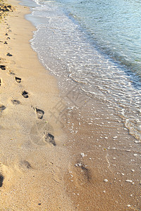 海滩 海浪和脚步图片