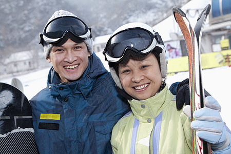 北京 世贸天阶滑雪度假胜地的微笑夫妇 摄影 滑雪服 滑雪板 旅行 冒险背景