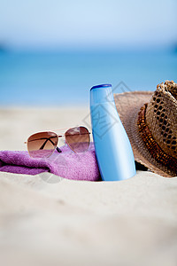假日在海滩上保护太阳的物体 时尚 洗剂 眼镜 旅行图片