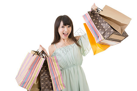 持有购物袋的有吸引力的亚洲妇女 激动人心的 假期 日本人图片