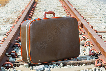 旅行袋和铁路图片