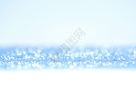 蓝火花背景 闪耀 背景虚化 圣诞节 庆典 发光的 新年 闪亮的图片