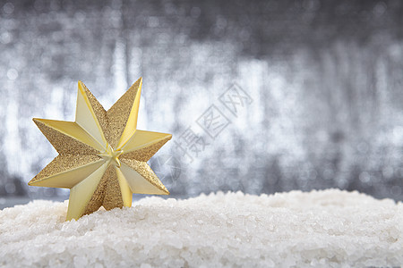 圣诞星 玩具 庆典 星星 火花 黄色的 季节 雪 华丽的背景图片